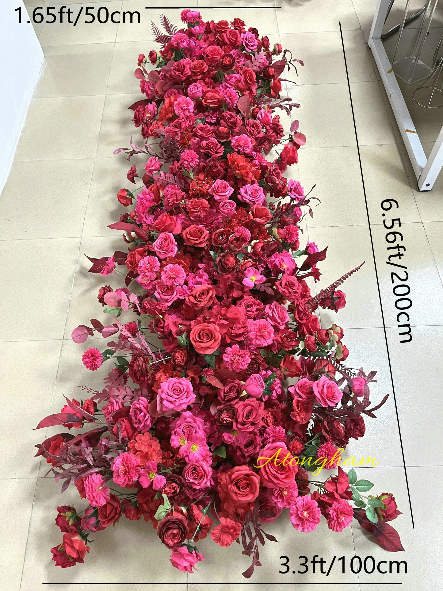 5D wedding arch floral arrangement in pink and red