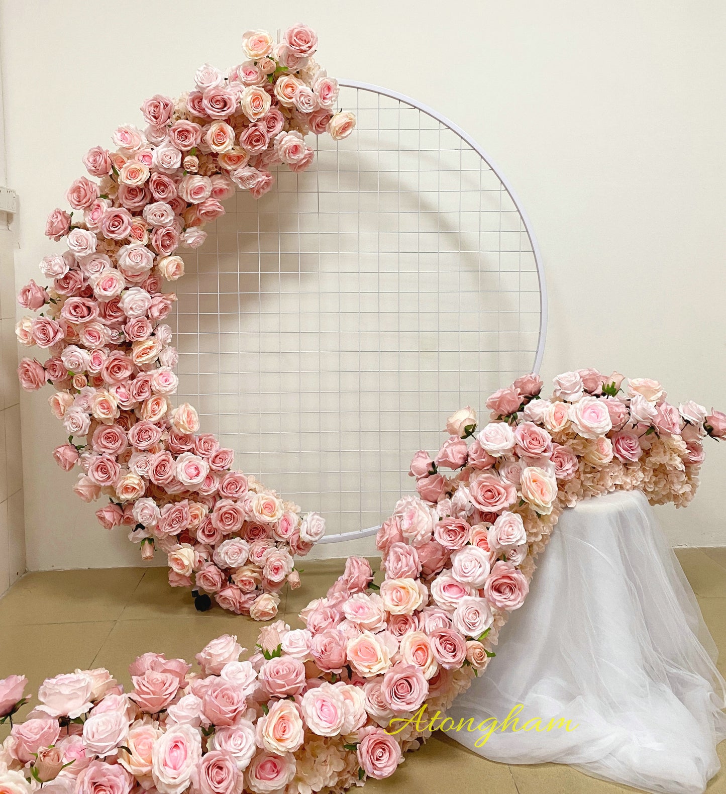 Blush pink aisle wedding flower arrangement