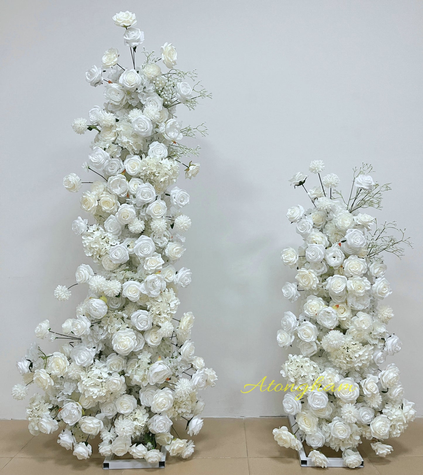 White silk wedding flower arrangement backdrop