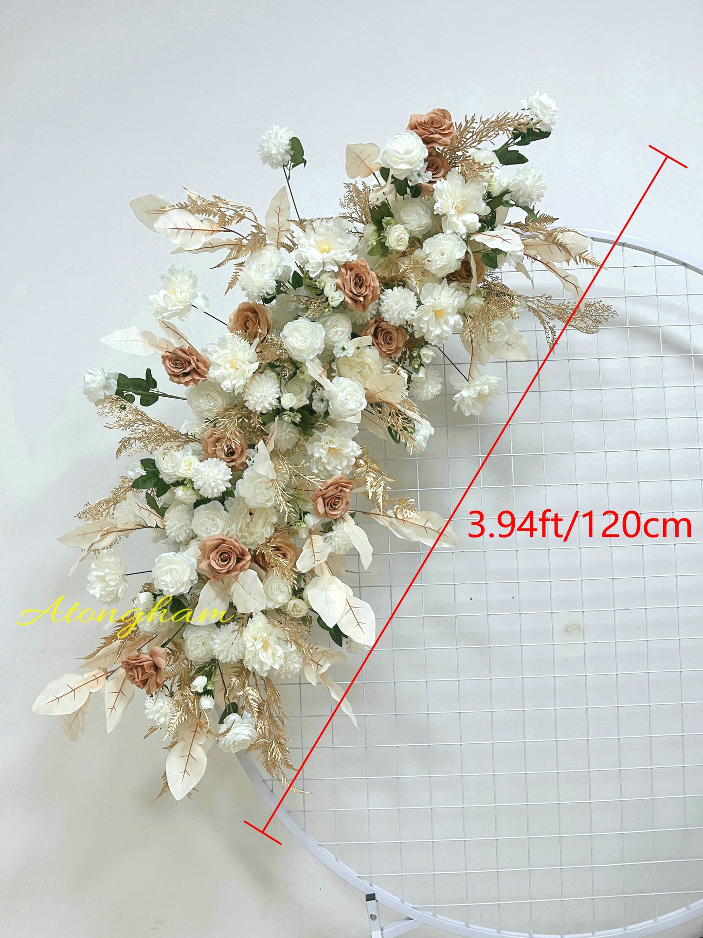 close up champagne ivory wedding arch flowers