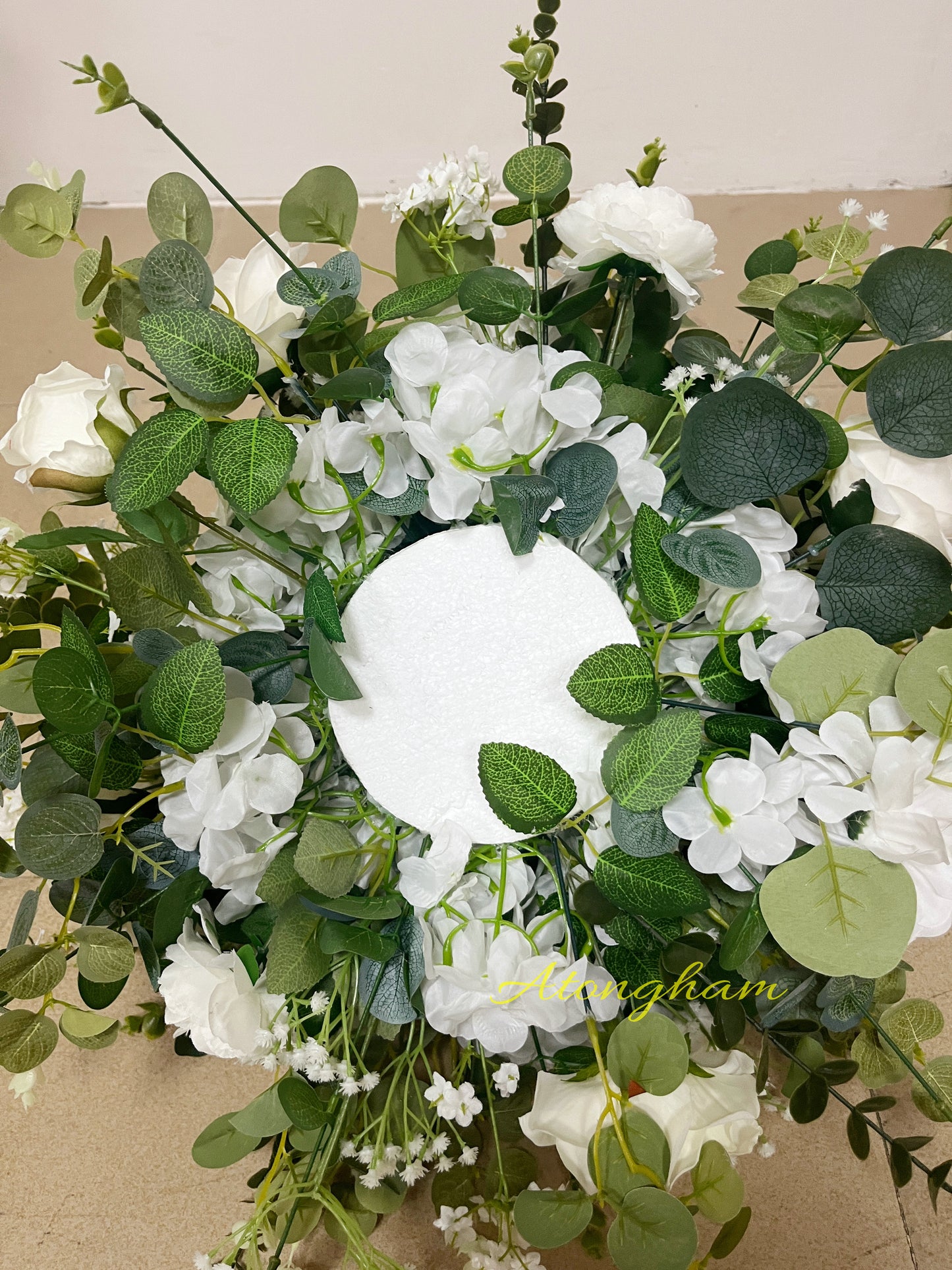 close up of ivory silk flower ball for weddings