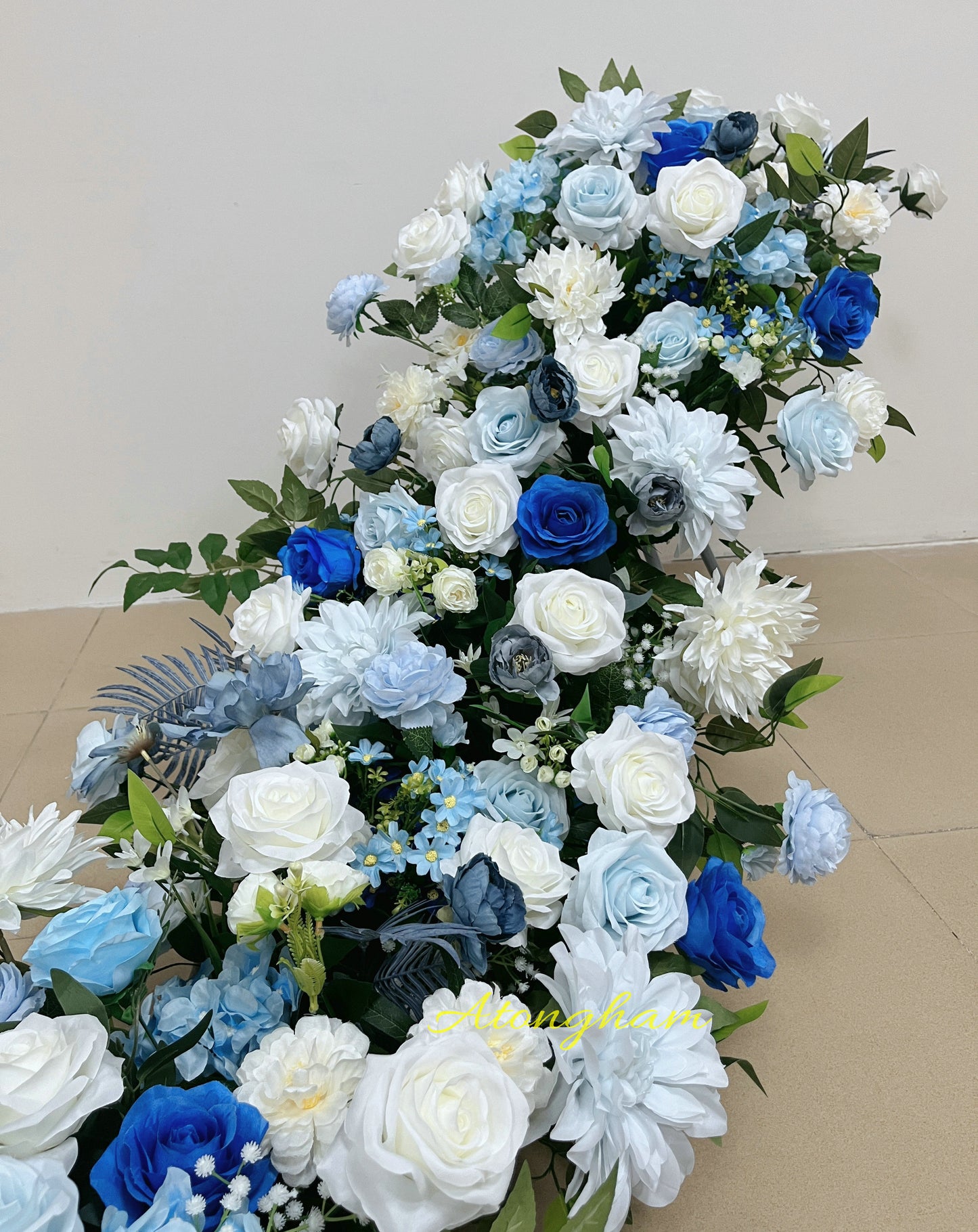 elegant blue floral garland for reception floor or table