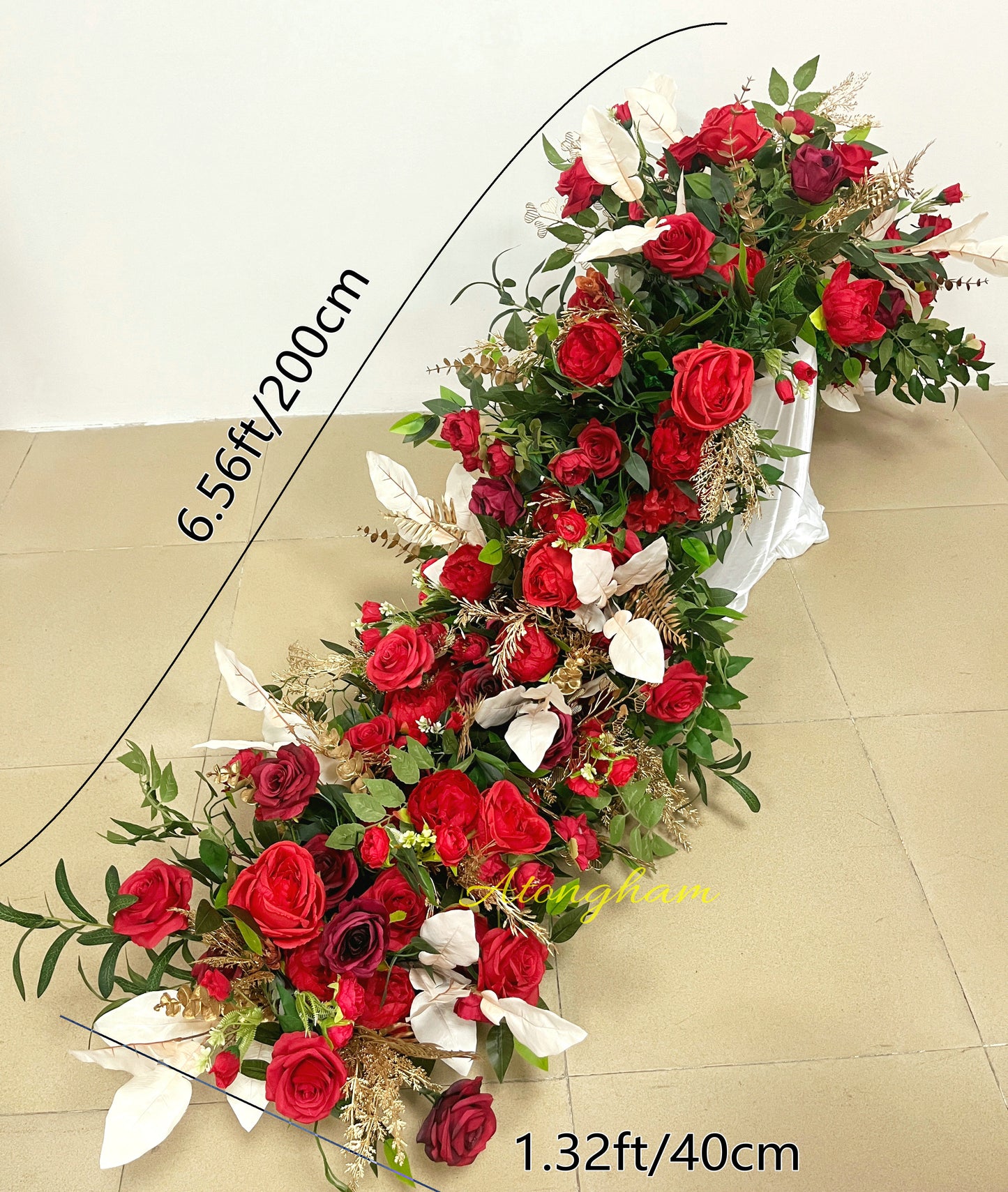 elegant burgundy floral garland for reception floor decoration