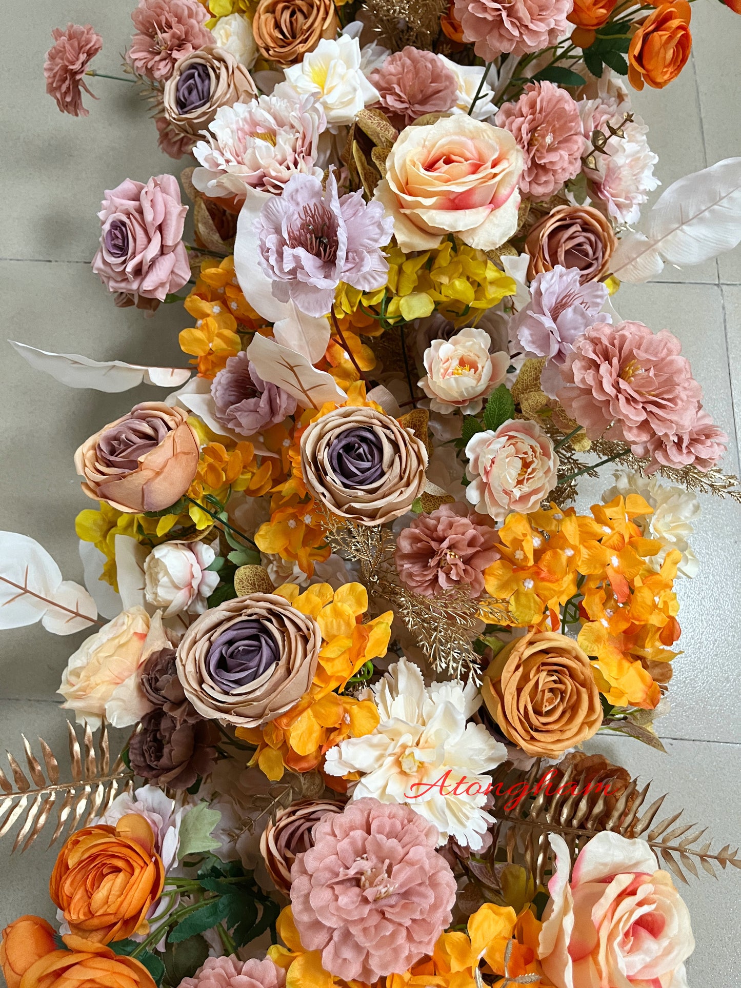 orange artificial flower runner for event floor decor