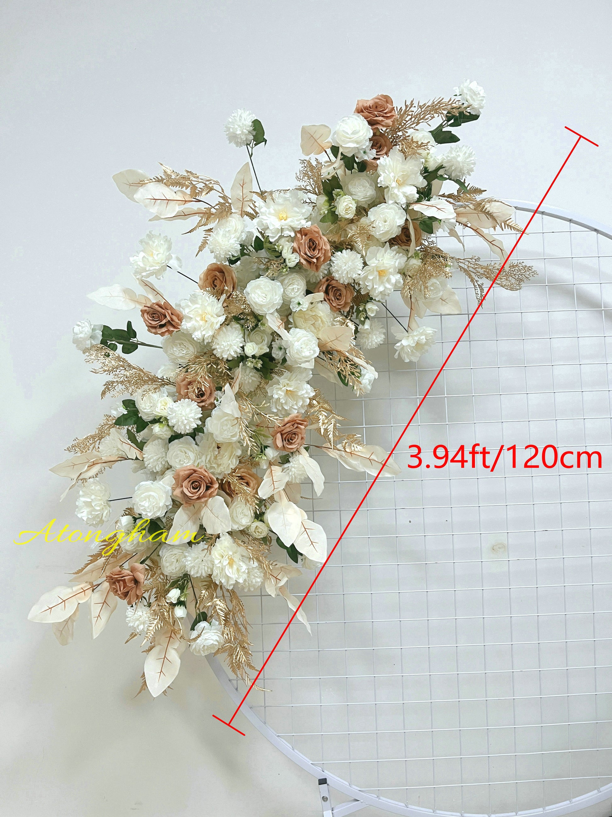 close up champagne ivory wedding arch flowers