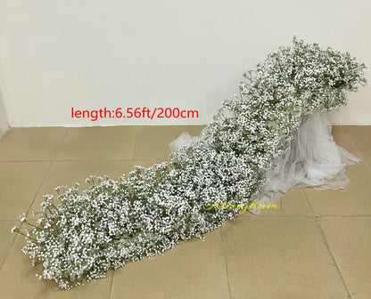 close up white gypsophila wedding flower runner